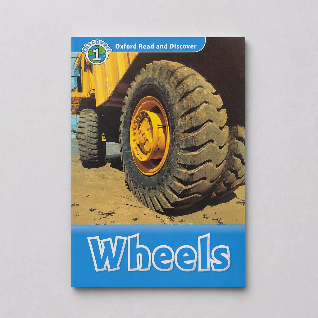 A children's educational book titled 'Wheels' from the 'Oxford Read and Discover' series, featuring a cover illustration of a large yellow construction wheel on a dusty ground, set against a light gray background.