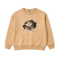 Beige sweatshirt with a cat design on a white background