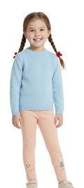 Young girl wearing a light blue sweater on a white background with 'arvin' branding.