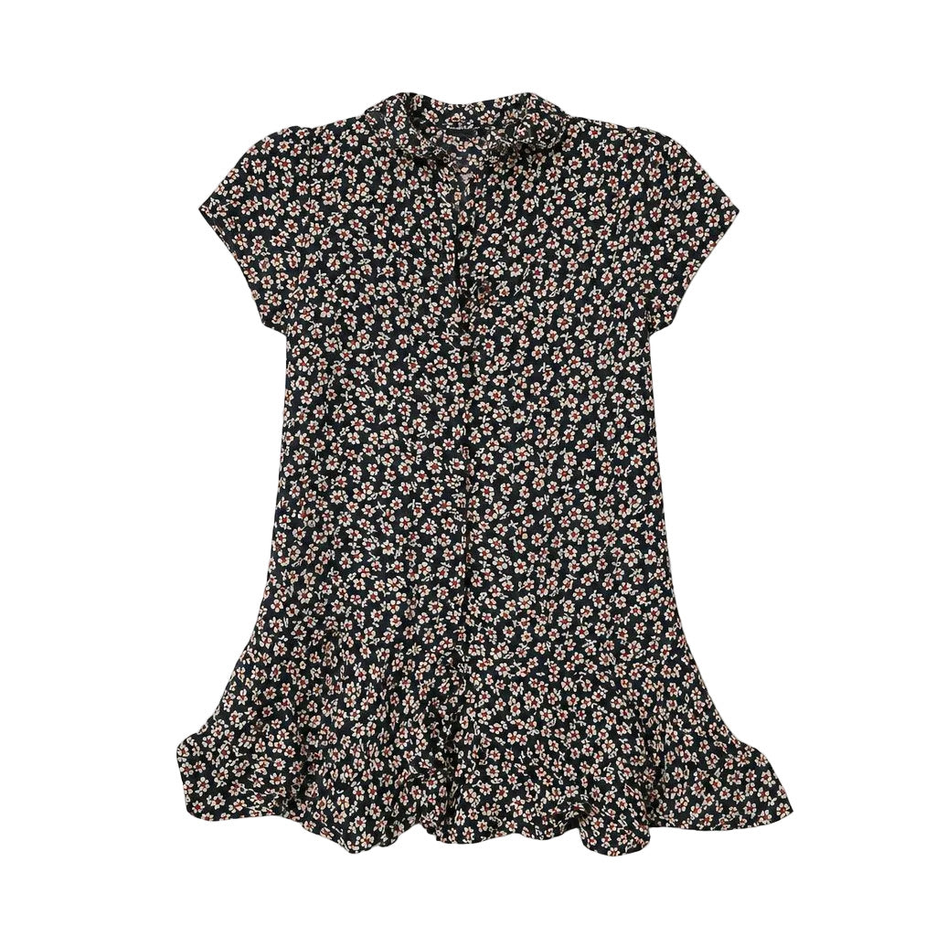 Floral-patterned dress on a light gray background