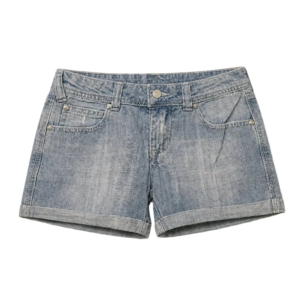 Light blue denim shorts on a gray background