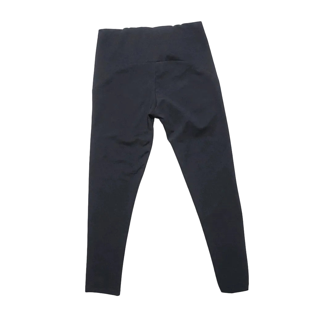 Black leggings on a light gray background