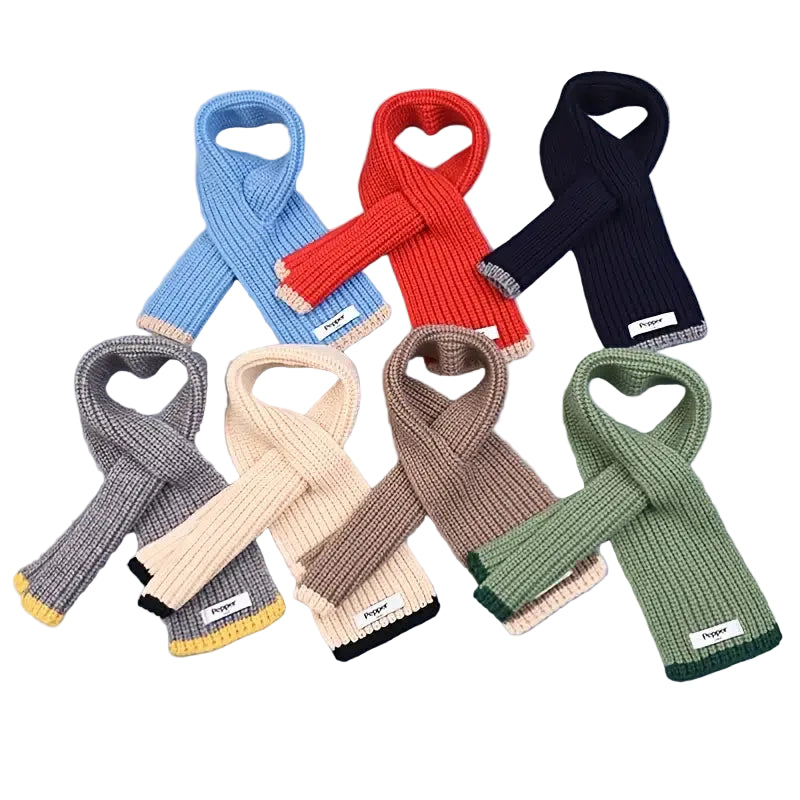 Set of colorful knitted scarves on a white background