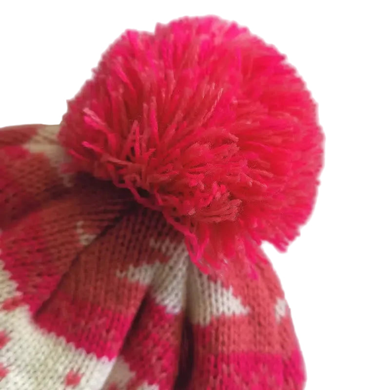 Red and white striped knit hat with a large pink pom-pom on a white background