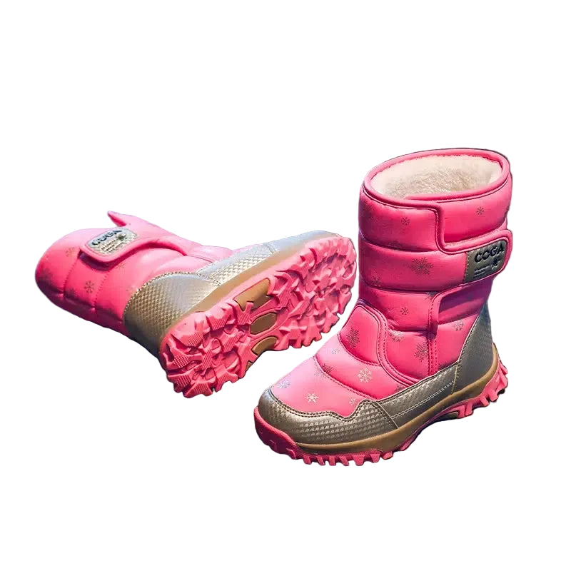 Pair of pink children's snow boots with brown soles on a white background